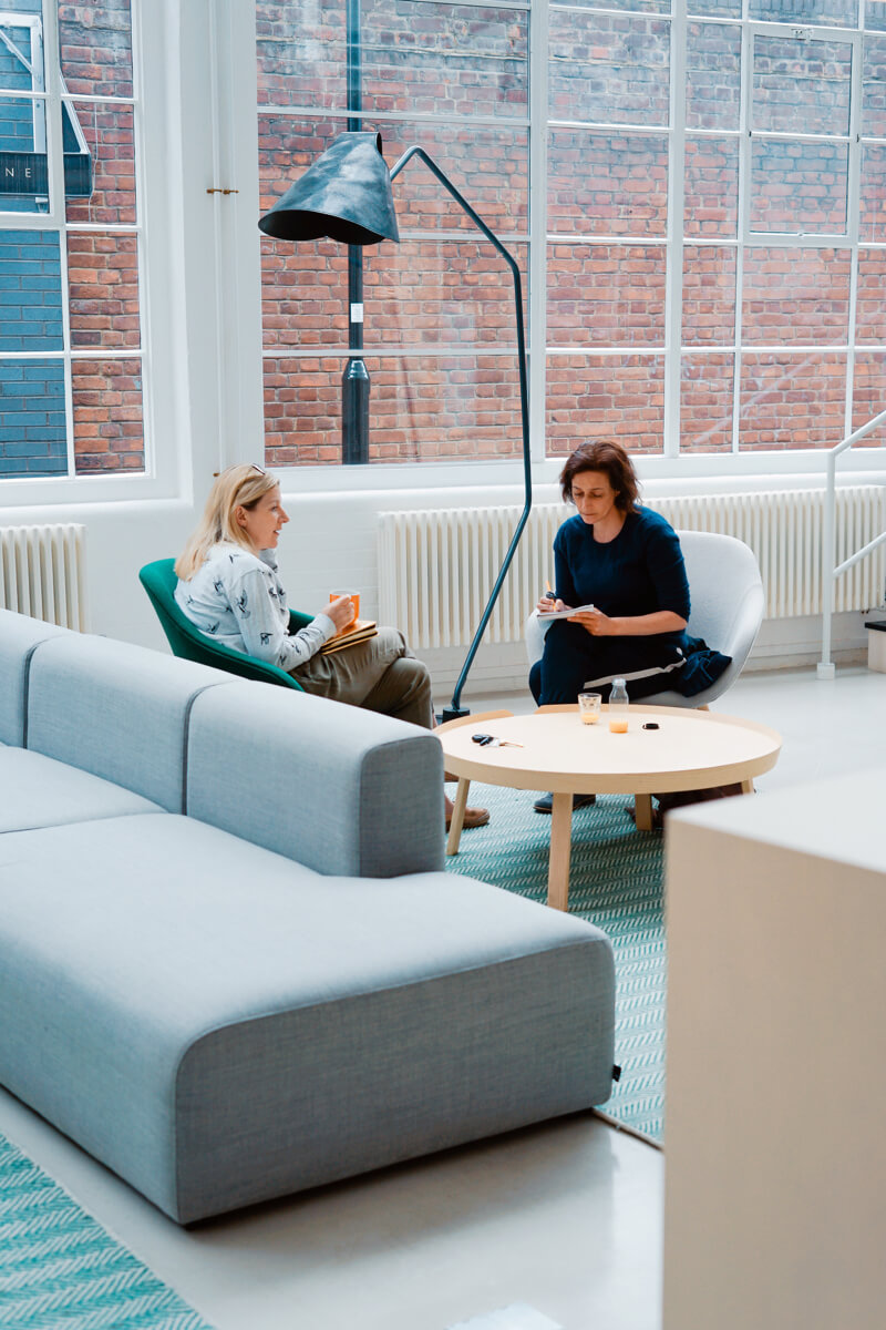 Two woman talking